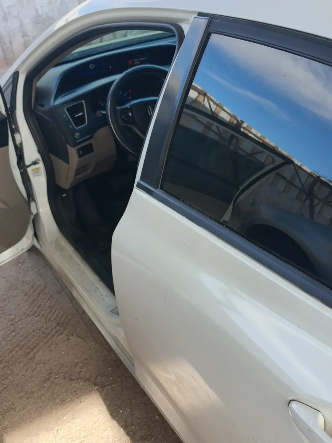 Puerta trasera del Honda Civic con la ventana funcionando otra vez