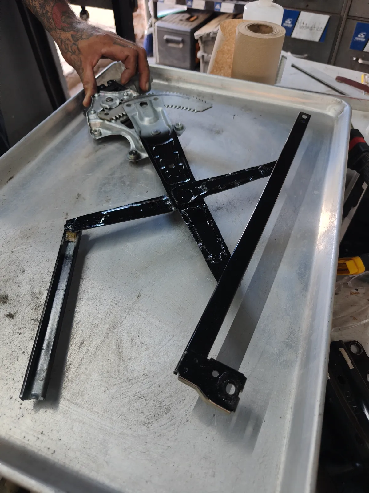 Brazos en X del elevador del Honda Civic reconstruidos y protegidos con pintura nueva